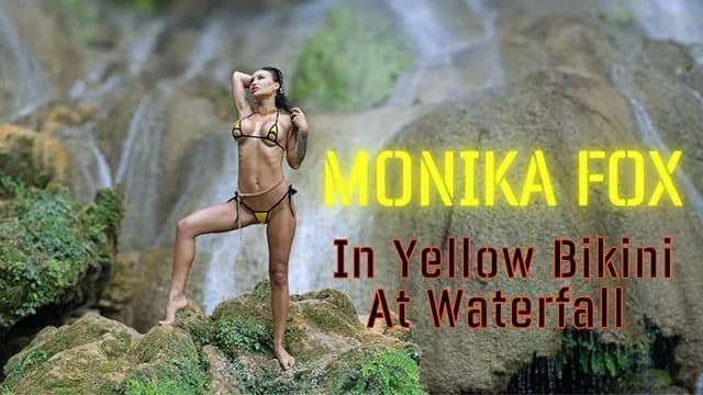 Brunette Poses in Yellow Bikini at Waterfall